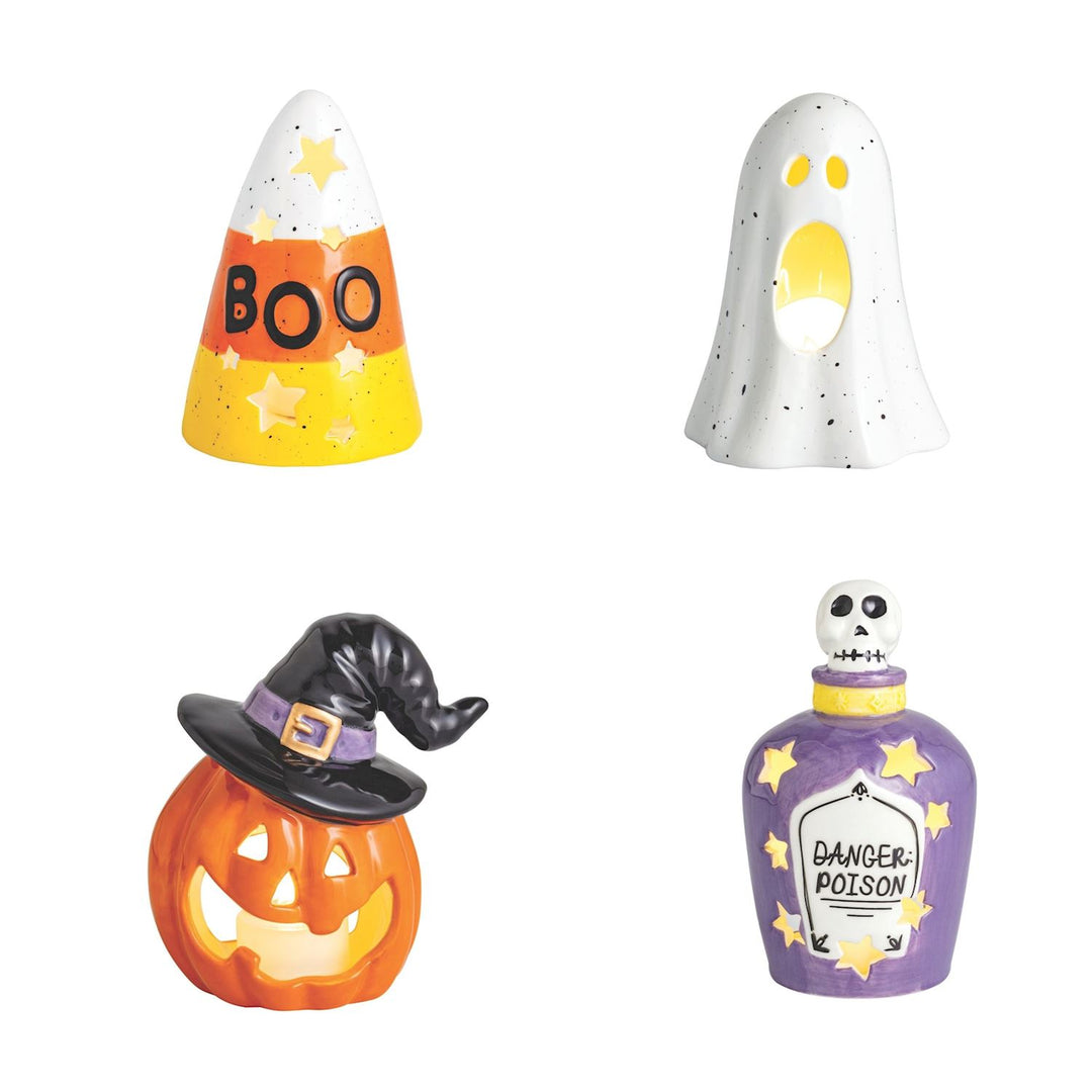 A set of four Halloween-themed votive holders designed as a candy corn, a ghost, a pumpkin with a jack-o-lantern face, and a bottle labeled 'Danger! Poison!'.