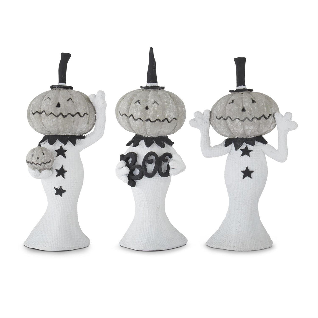 Three Halloween-themed pumpkin figures with black accents on a white background