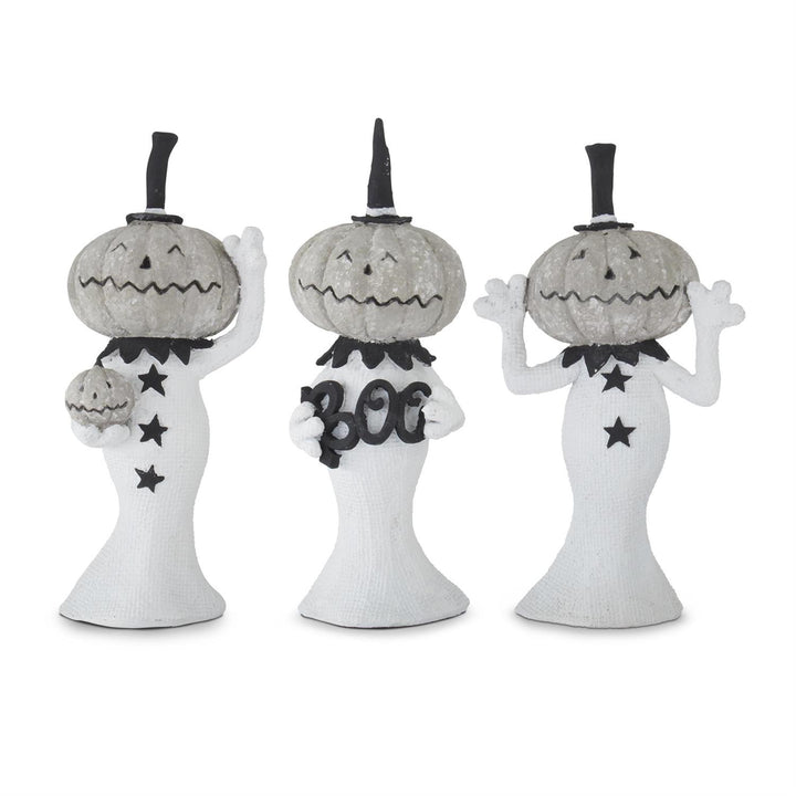 Three Halloween-themed pumpkin figures with black accents on a white background