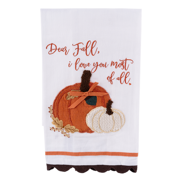 white kitchen tea towel featuring textured pumpkins