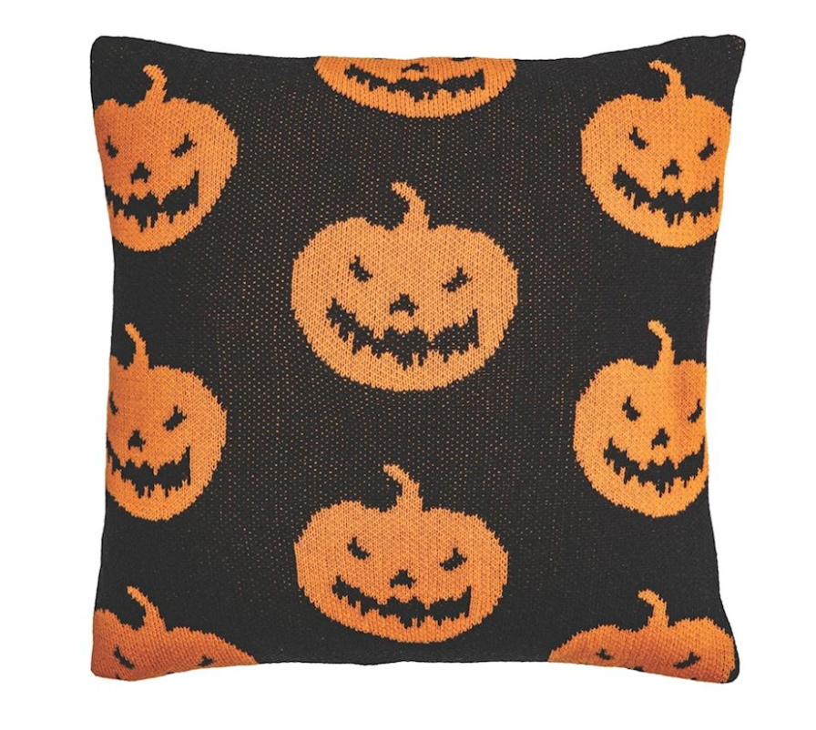 Square knit pillow,with a jack-o-lantern design.