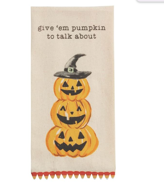 Halloween-themed towel with a stacked jack-o-lantern design. Text on towel reads; Give 'em Pumpkin to talk about