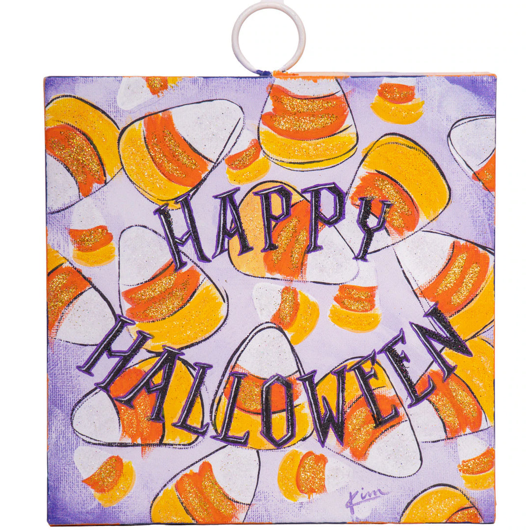Halloween-themed pouch with candy corn design and 'Happy Halloween' text on a purple background.