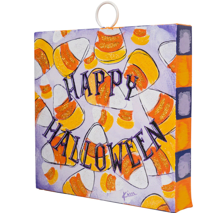 Halloween-themed decorative box with candy corn design and 'Happy Halloween' text.